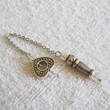 Alloy silver metallic rod dowsing pendulum with a heart-shaped metallic handle on a silver chain