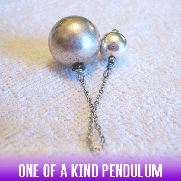 Silver alloy ball dowsing pendulum on a silver chain