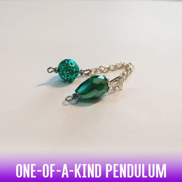 A one-of-a-kind petite drop-shaped dowsing pendulum made with crystal glass faceted beads with silver end caps on an silver chain.